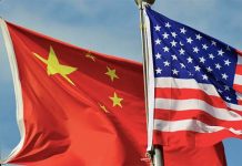 美國通膨、中國通縮，阻礙北京超美企圖。圖／翻攝新華網
